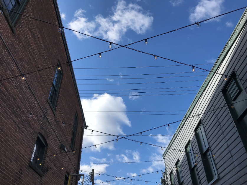 string lighting between two buildings 